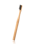 Afbeelding van een bamboe tandenborstel met Charcoco staand