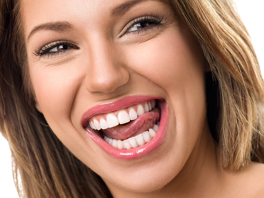 Wat is de oorzaak van gele tanden?